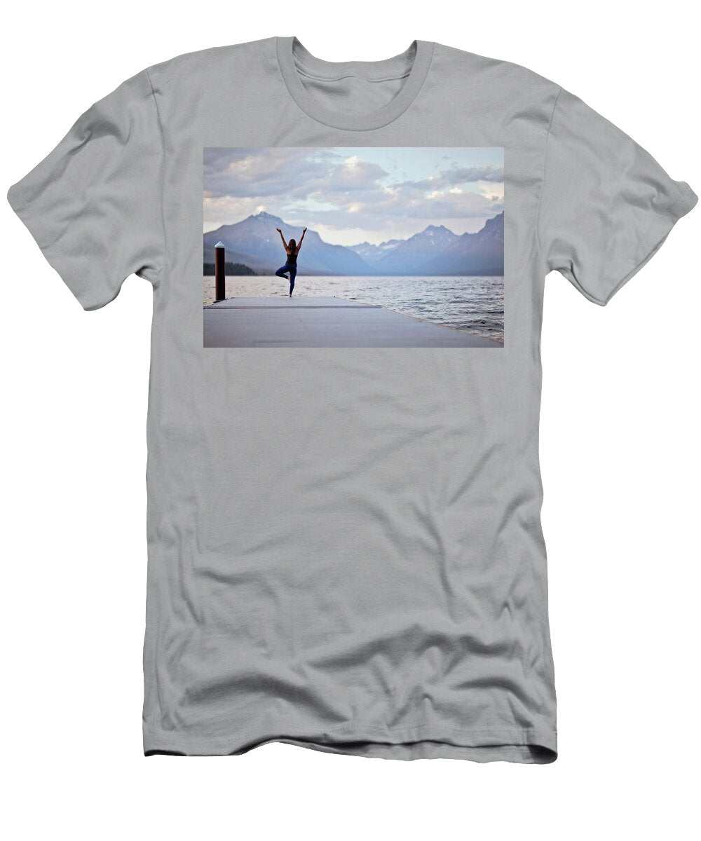 1 a Woman Does Yoga on a Dock in Glacier Chris Bennett T-Shirt