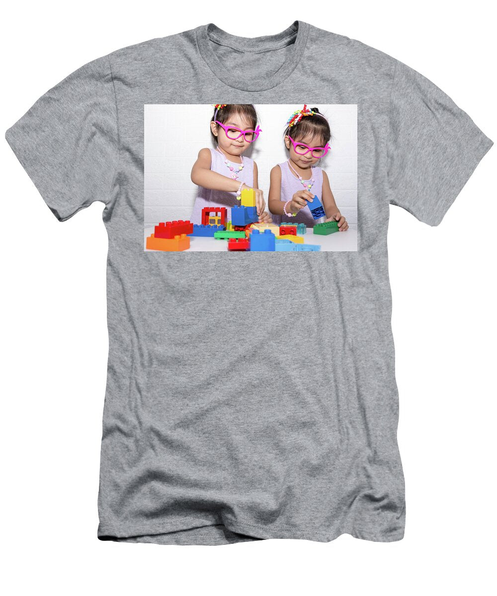 4 Female Asian Identical Twins Sitting on Chair with White Backgro Bill Roque T-Shirt