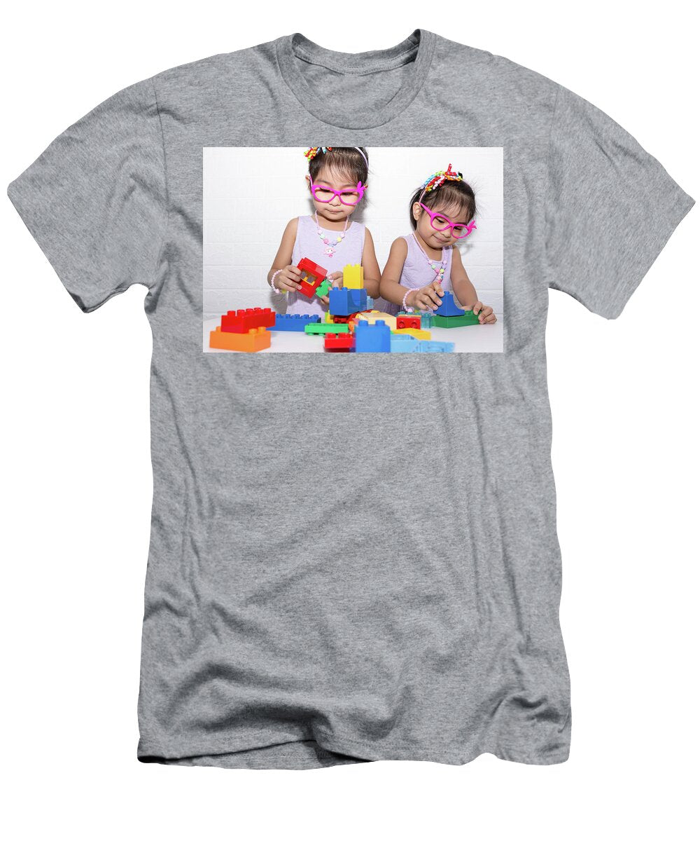 6 Female Asian Identical Twins Sitting on Chair with White Backgro Bill Roque T-Shirt