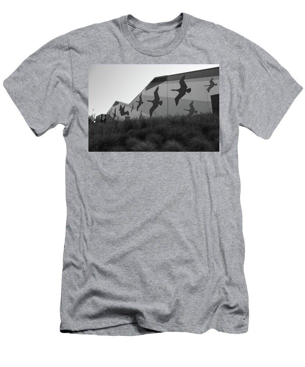 Flying Ducks on the Side of a Building At the University of Oregon in Black and White Eldon Mcgraw T-Shirt