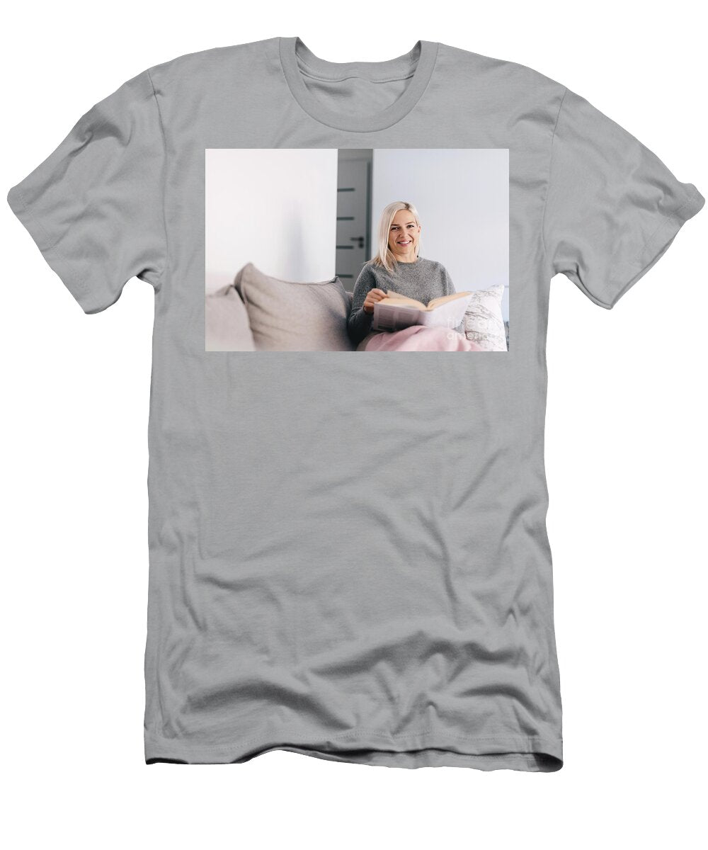 Happy Woman Sitting on Couch Reading Book Michal Bednarek T-Shirt