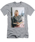 Woman Reading Book on the Couch Michal Bednarek T-Shirt