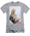 Woman Reading Book Sitting on the Couch Michal Bednarek T-Shirt